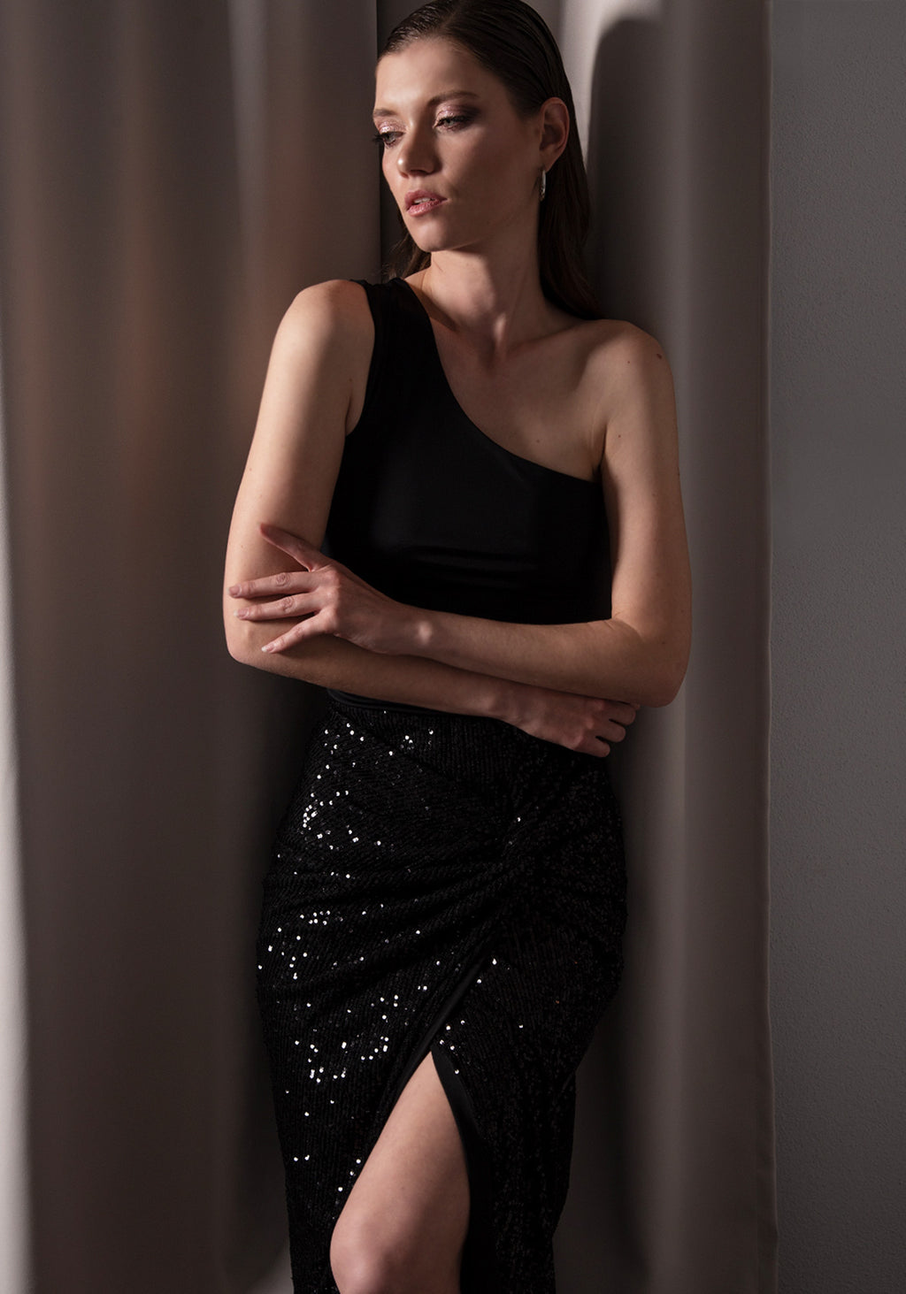 Asymmetrical Slit Knot Front Skirt in Black Sequins