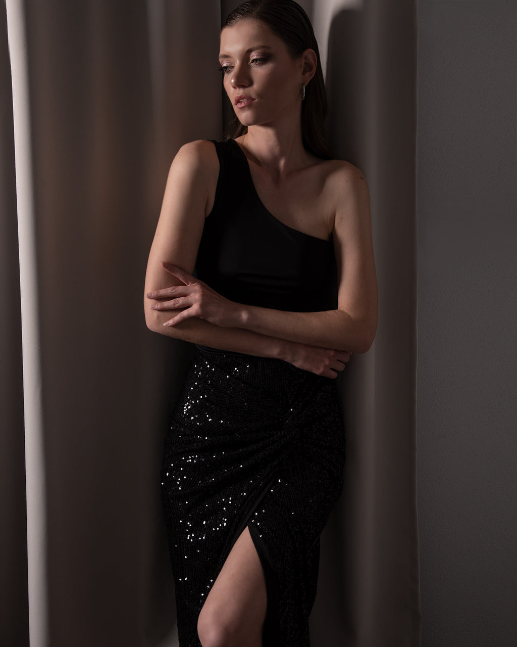 Asymmetrical Slit Knot Front Skirt in Black Sequins